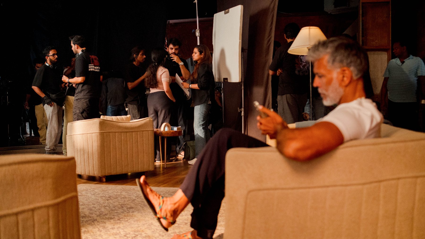 Behind the scenes, Centre for Sight with Milind Soman: Milind between takes on the lounge set