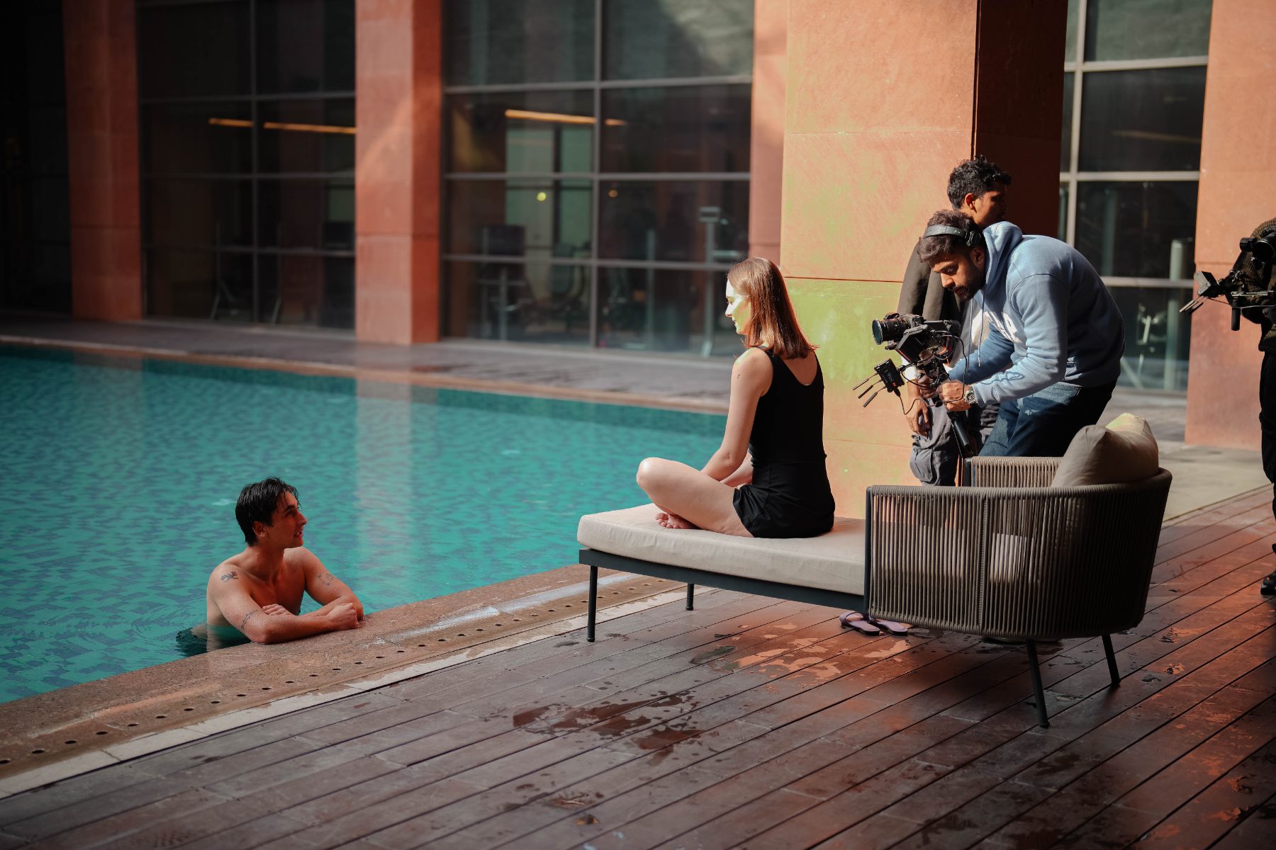 Behind the scenes at Elevate Residency: Poolside setup with the camera on the lounger