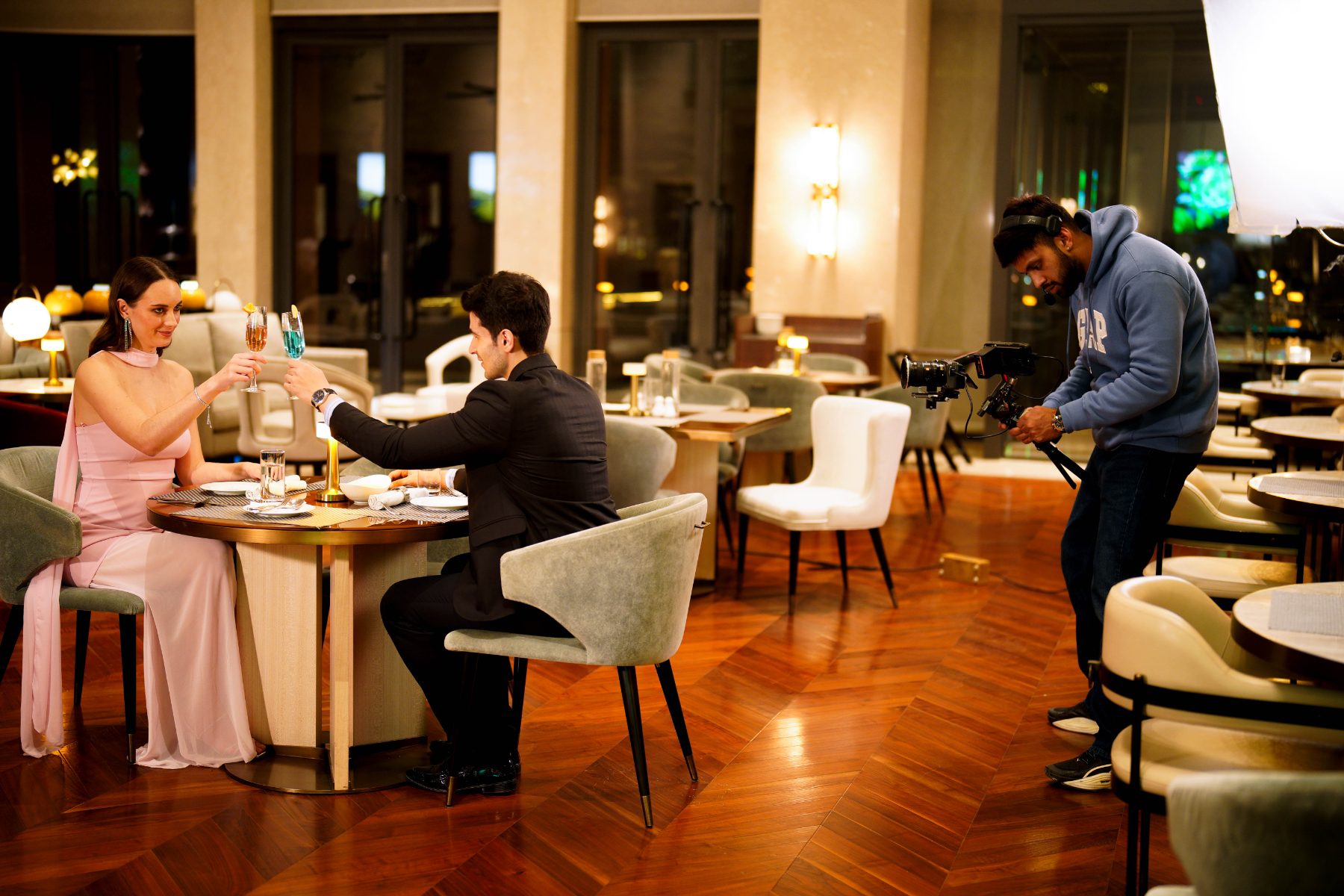 Behind the scenes at Elevate Residency: Camera on the dinner date set